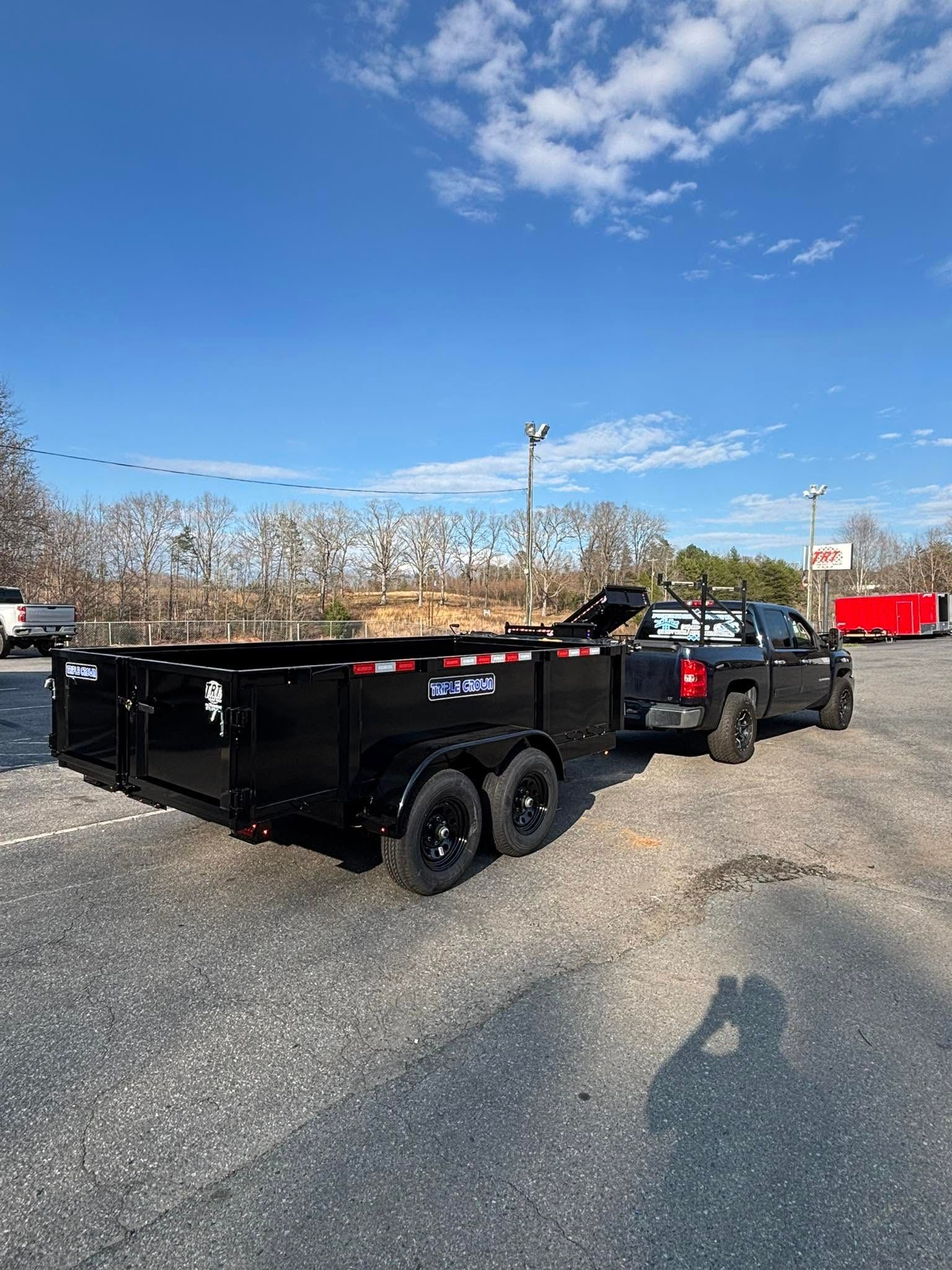 JP’s work truck and equipment trailer